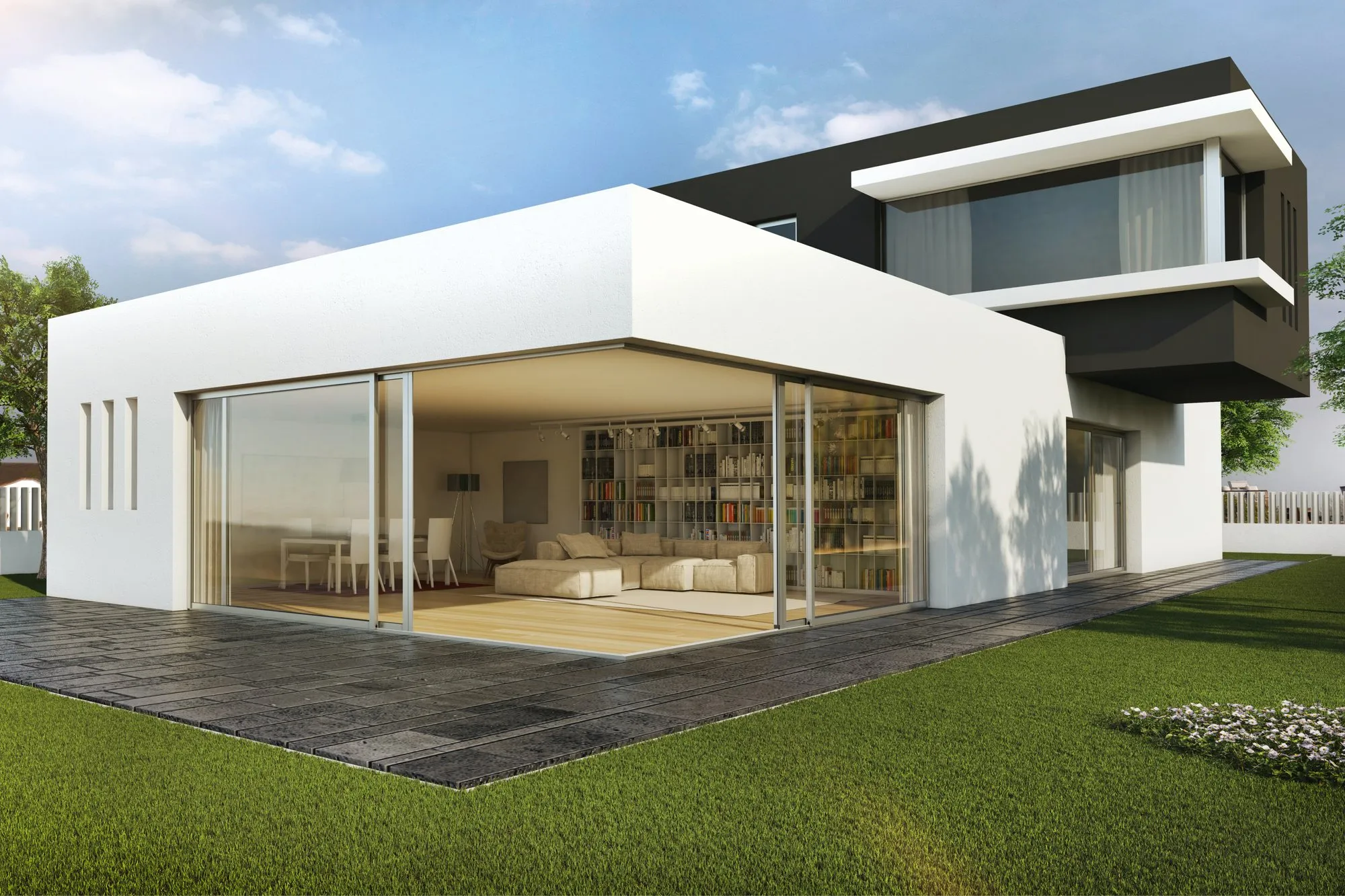 Maison blanche avec un coulissant d'angle ouvert sur la terrasse