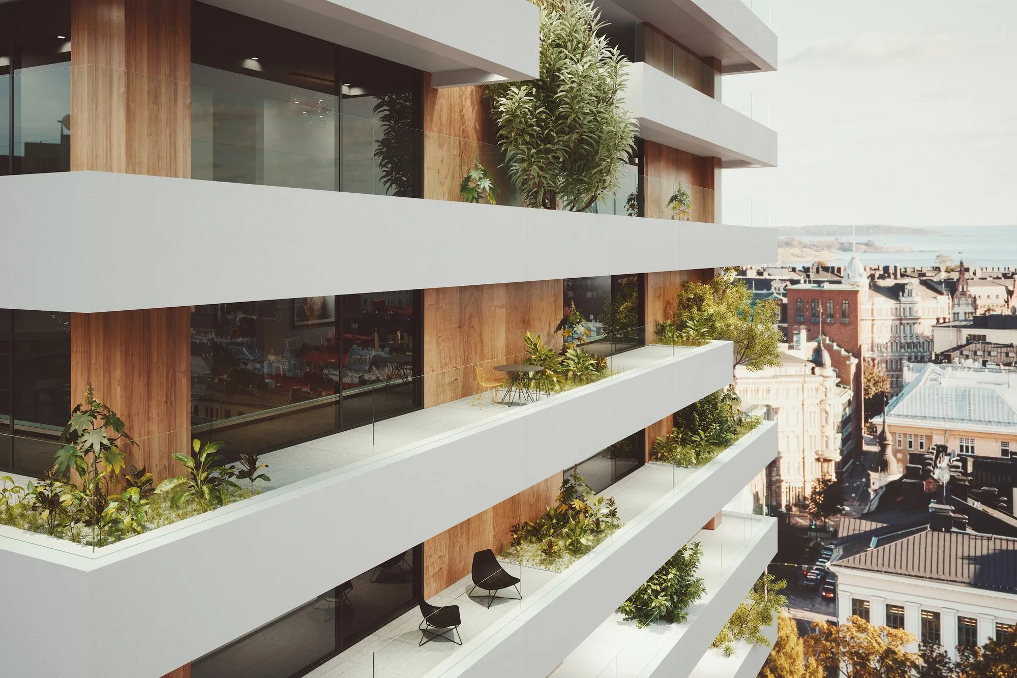 Façade d'immeuble avec terrasses en gradins et baies coulissantes