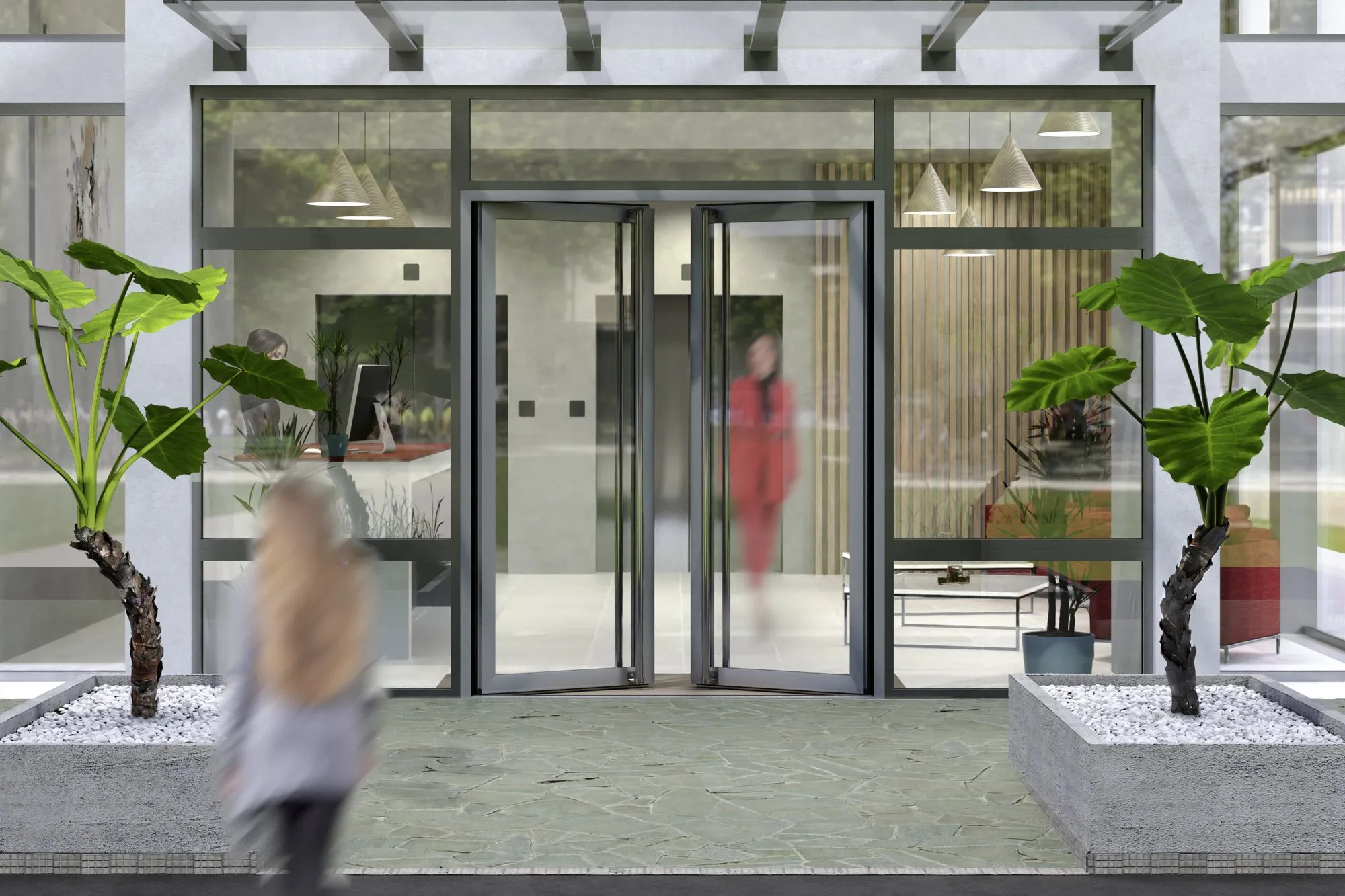 Entrée d'hôtel avec portes vitrées à deux vantaux